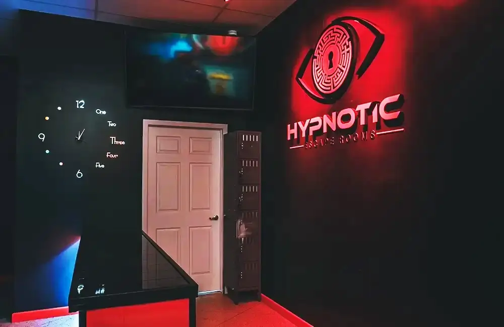 The lobby's clock wall and the door through to the escape rooms