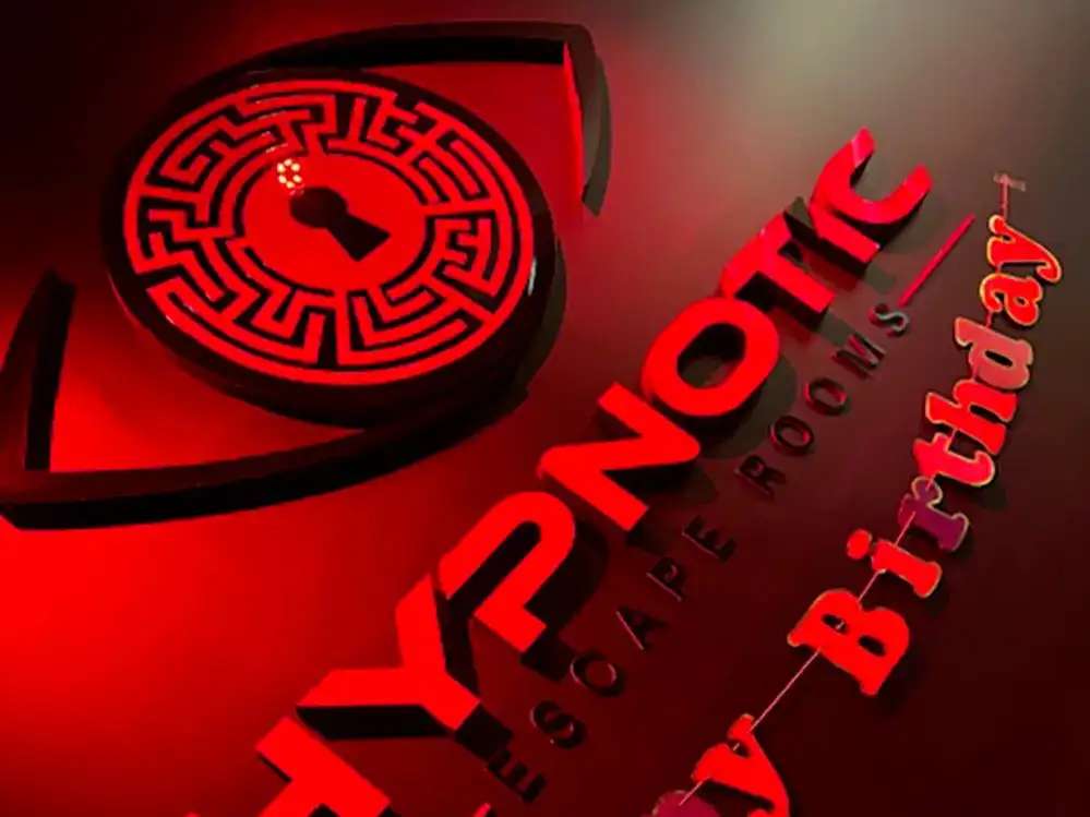 The backlit Hypnotic 'Happy Birthday' sign seen at close range