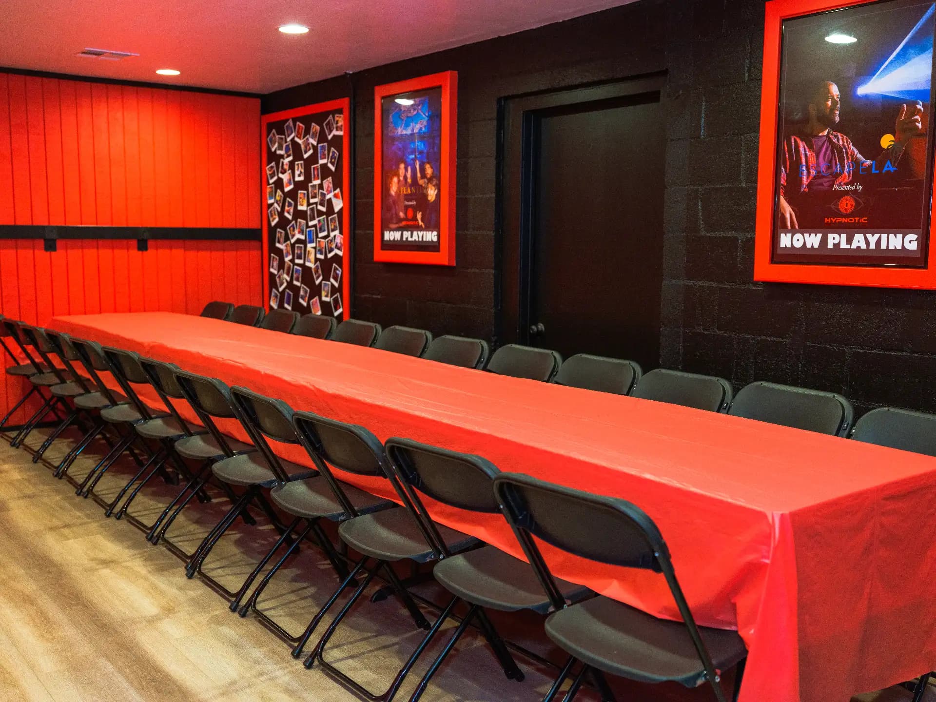 The full length of the party room table seen from the entrance door